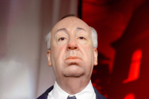 Alfred Hitchcock Wachsfigur im Madame Tussauds Wachsfigurenkabinett in Wien, Bildnachweis:  Anton_Ivanov / Shutterstock.com
