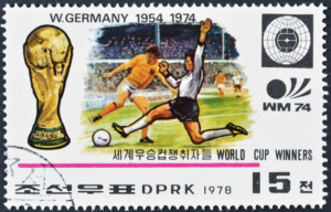 Gedenkbriefmarke aus Nordkorea mit Siegen Westdeutschlands bei den Fußballweltmeisterschaften 1954 und 1974; Bildnachweis: ilapinto / Shutterstock.com